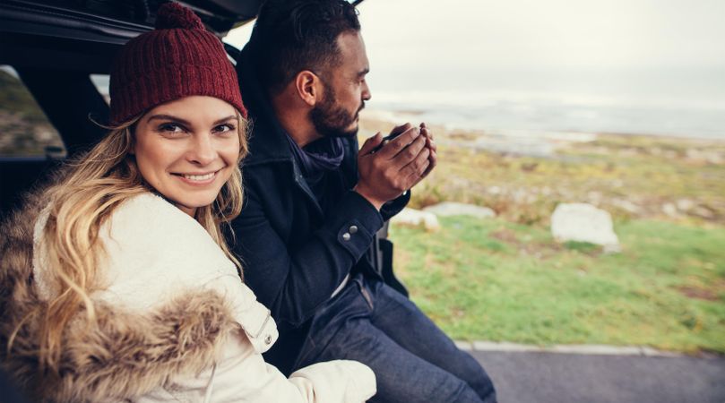 Couple on road trip during winter