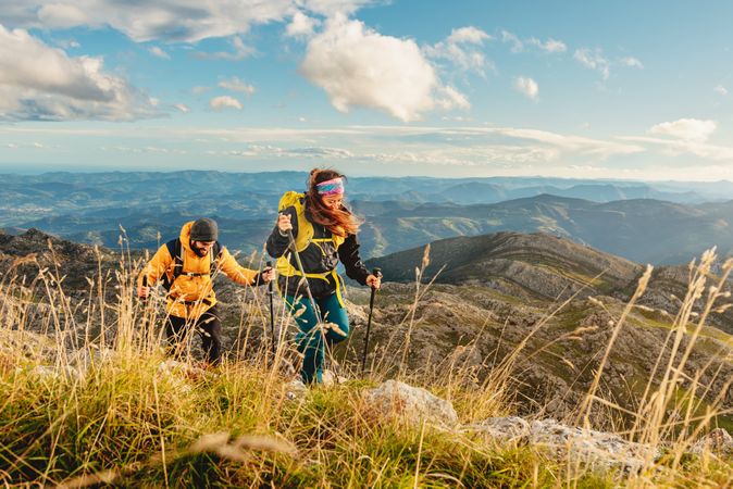 people trekking in the mountains