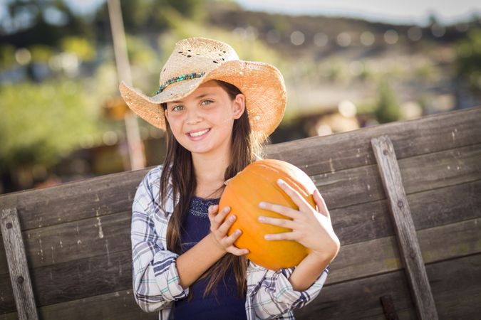 Preteen Girl Portrait at a Pumpkin Patch