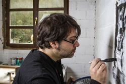 Painter artist working on a oil canvas