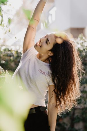 Cheerful woman in garden