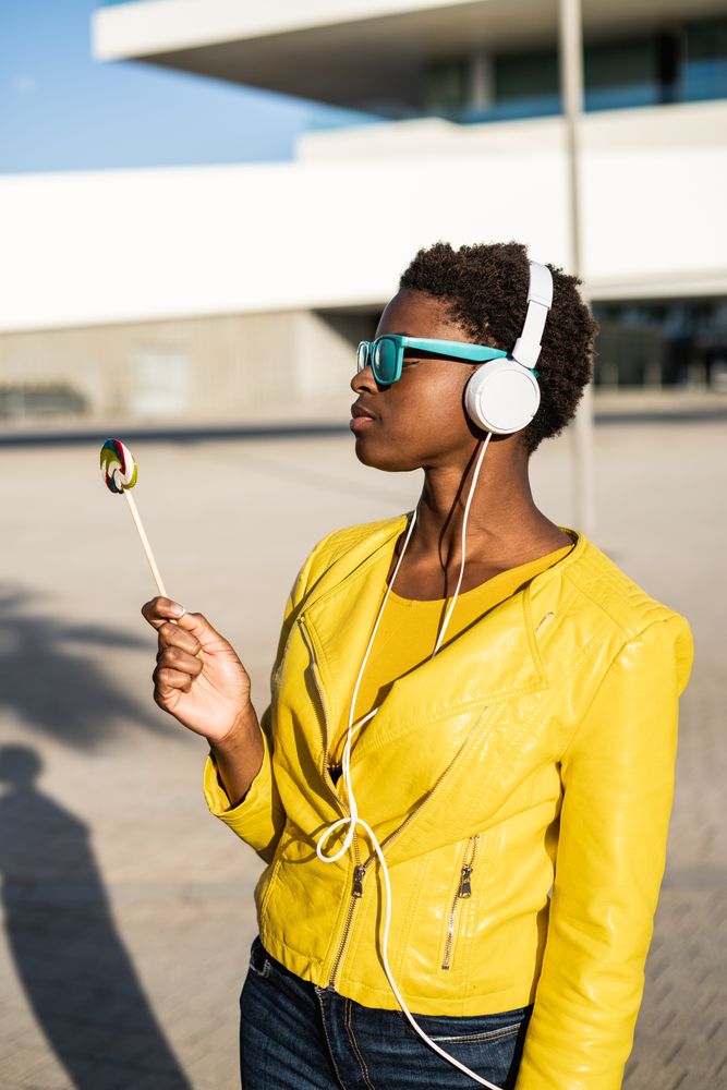 Black woman eating candy