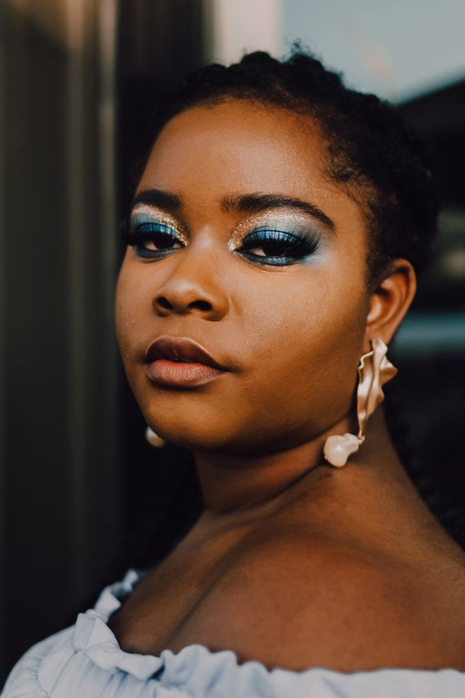 Content trendy Black woman on street