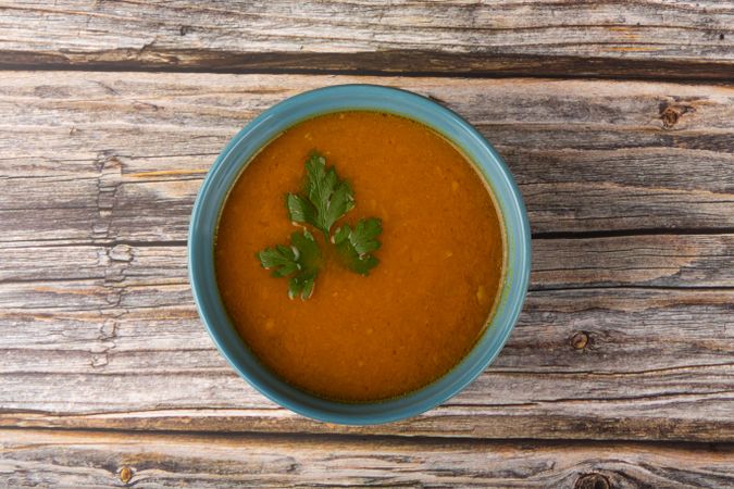 Delicious homemade pumpkin soup in bowl.