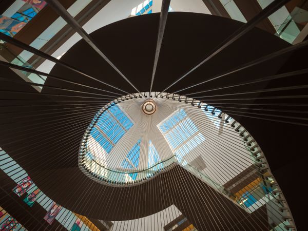 Geometric staircase and glass roof in a modern building. Look up. Library of Strasbourg.