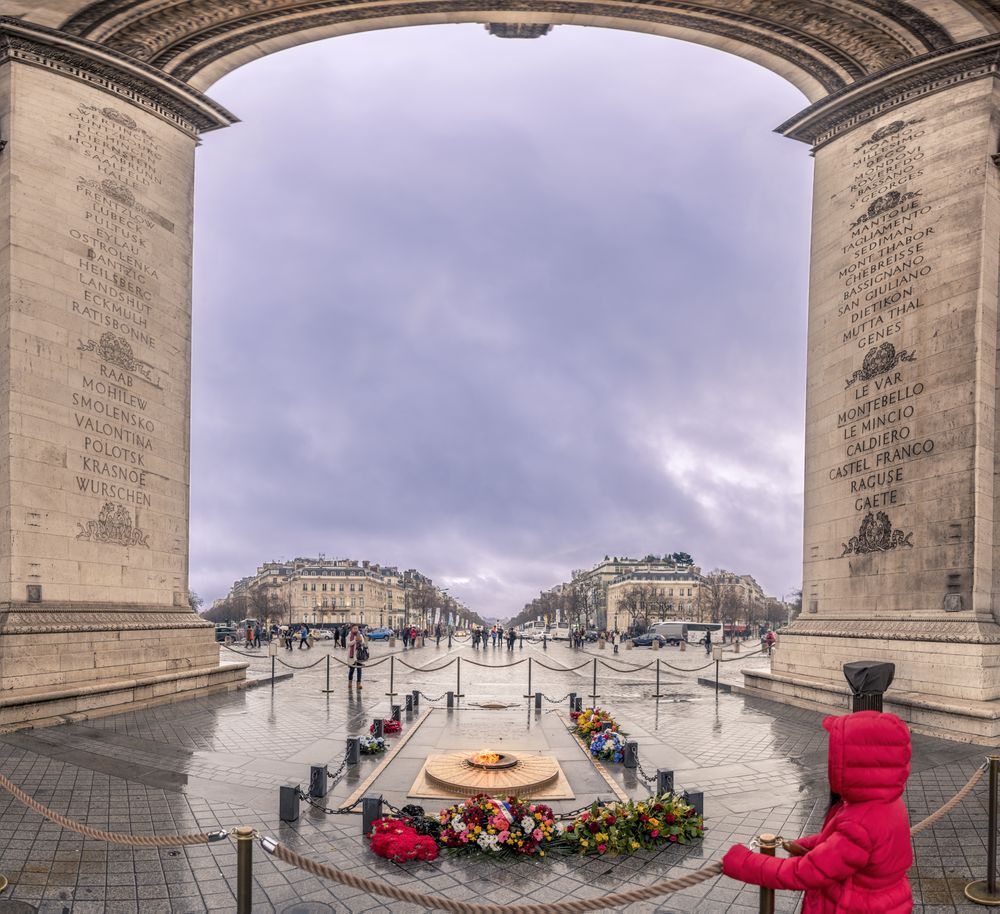 Paris on a rainy day, at the Arch of Triumph