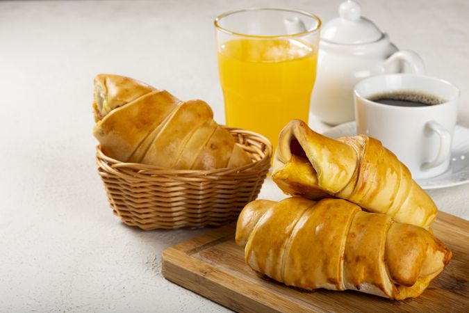 Traditional fresh baked croissants on the table.