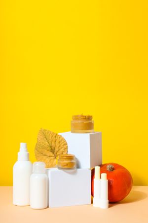 Concept of different cosmetic products, Pumpkin cosmetics, space for text