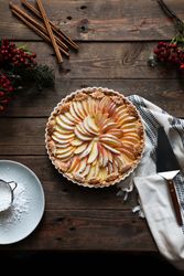 tasty apple pie on a wooden table ready to eat