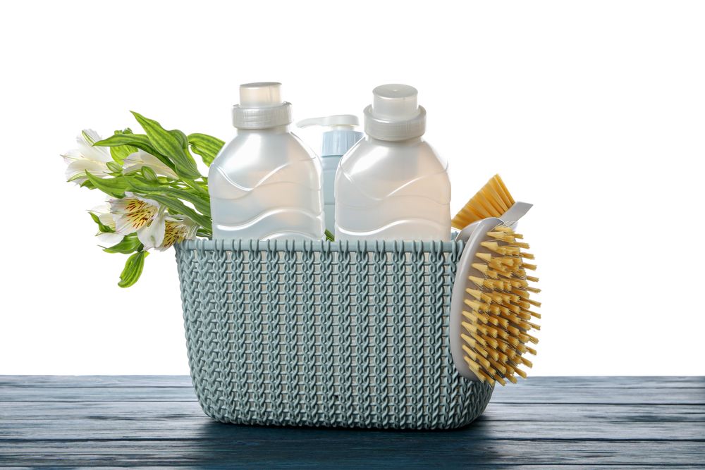 Detergents in a basket, isolated on plain background