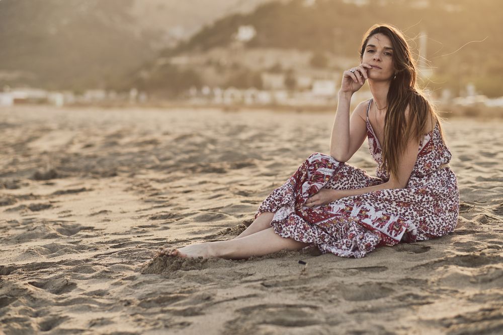 Woman with dress at the beach