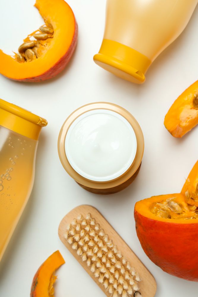 Concept of different cosmetic products, Pumpkin cosmetics, top view