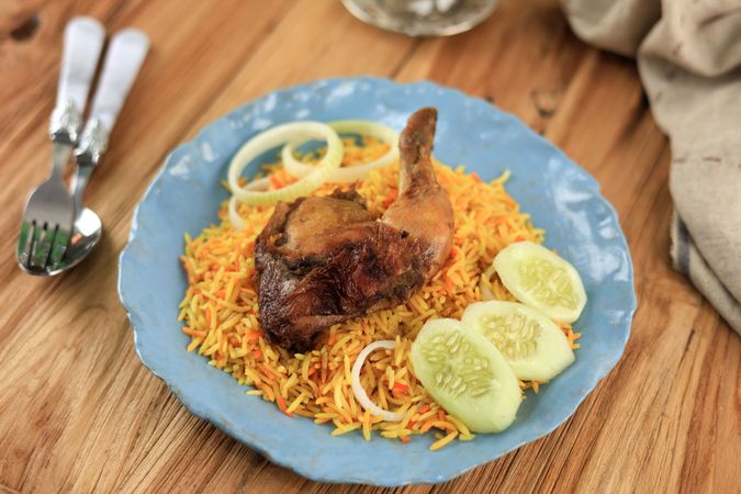 Nasi Kebuli Ayam on Wooden Table