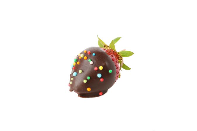 Chocolate fondue. Strawberry in chocolate isolated on blank background