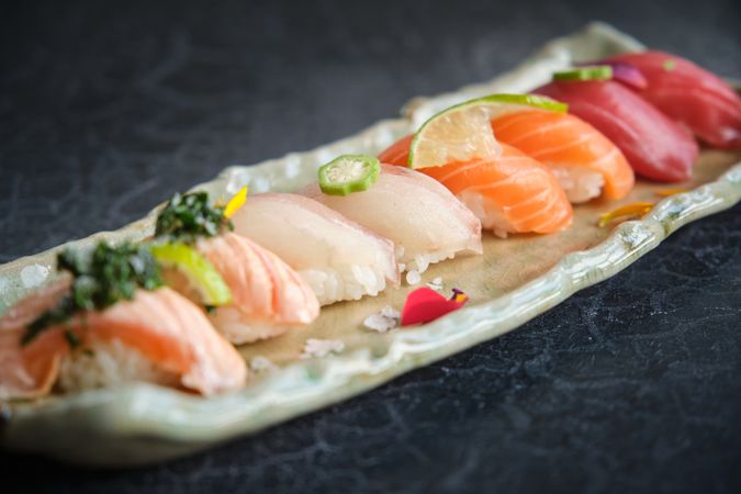 Elegant sushi pieces presented on a platter