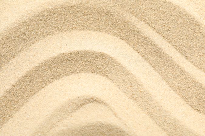 Seamless sand on a whole background, space for text and closeup. Summer vacation backdrop