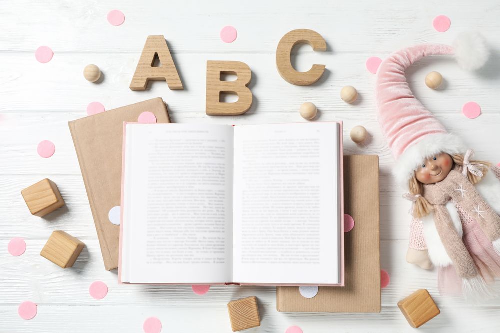 Concept of baby book or books for children, top view