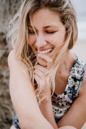 happy female with wild fair hair