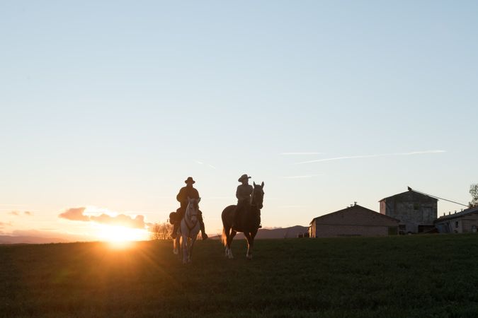 Man and woman riding horses