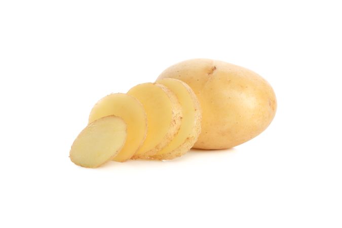Potato sliced on plain background
