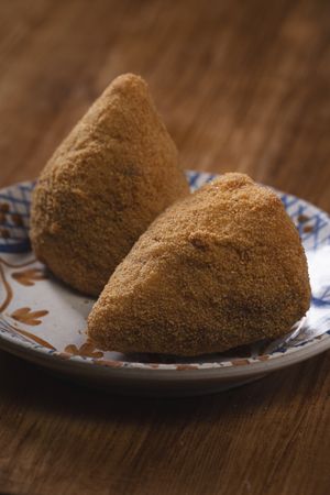 Two Sicilian Arancini on Plate