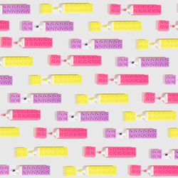 Flatlay of highlighters in pattern on plain background