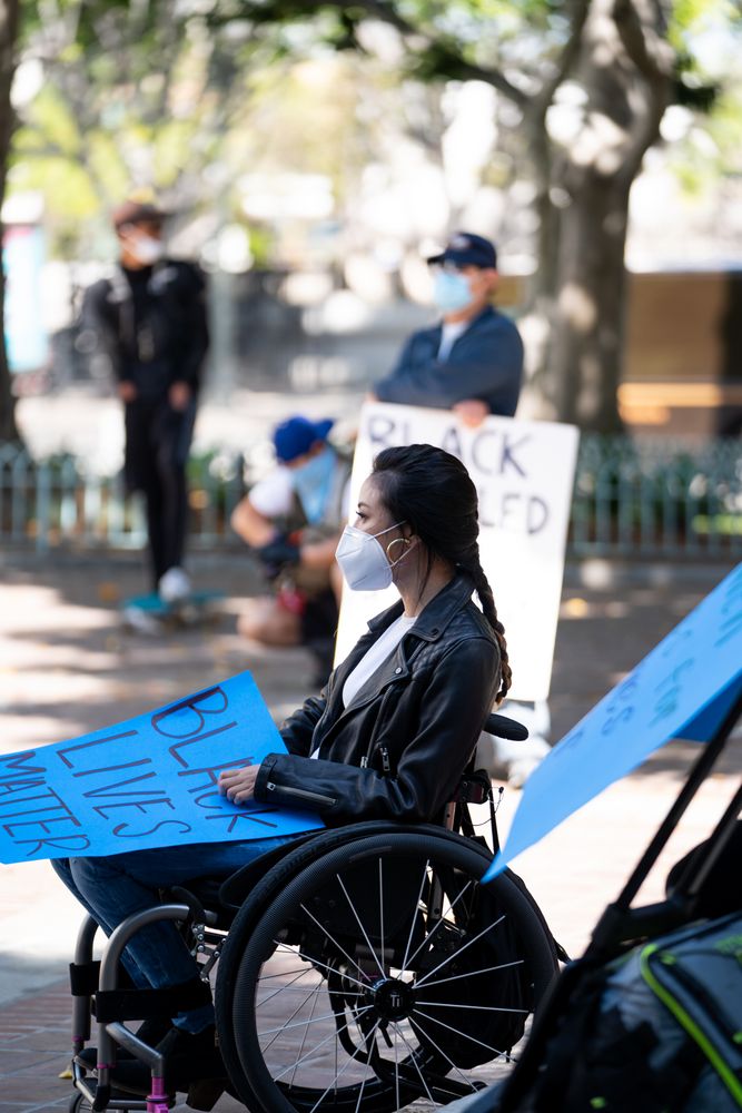 Los Angeles, CA, USA — June 16th, 2020: woman holding sign at protest rally