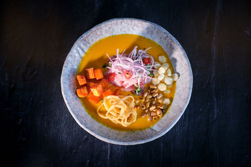 Delicious authentic dish served in bowl on surface