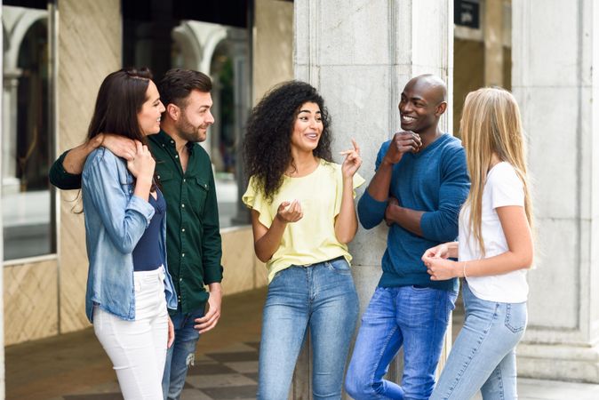 Group of friends catching up outside
