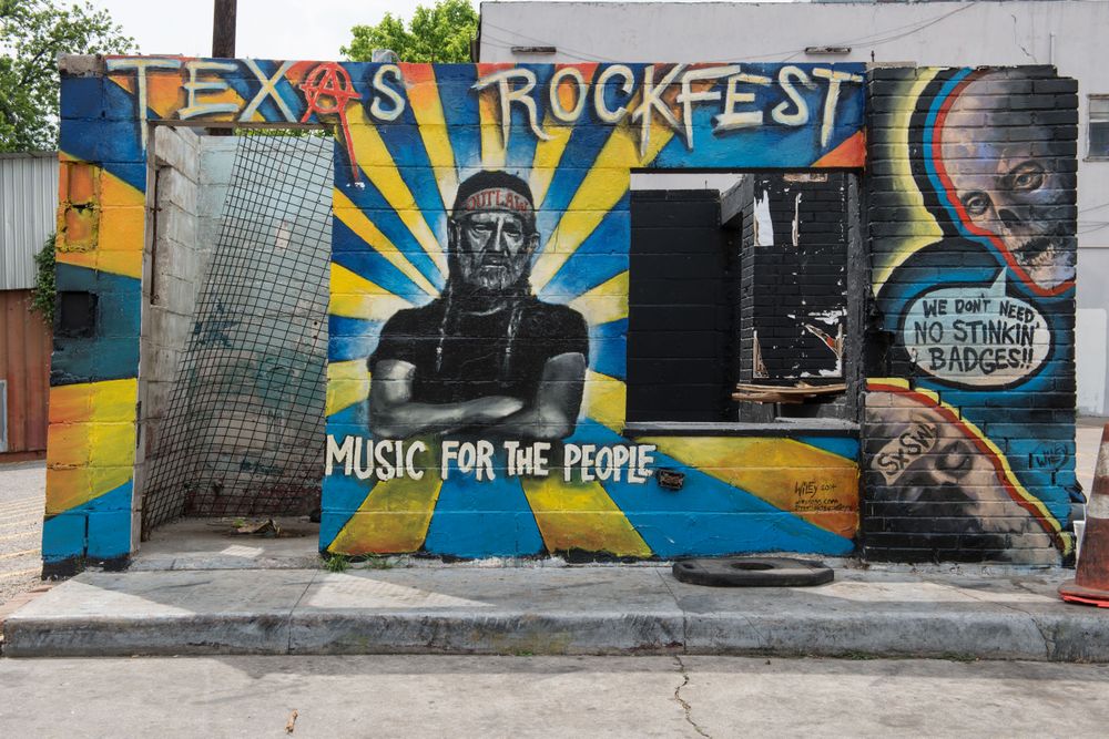 Mural of Willie Nelson outside venue, Austin, Texas