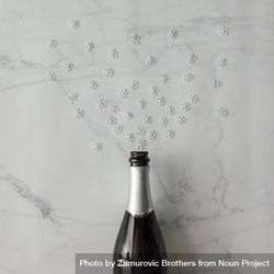 Champagne bottle with snow flakes on marble background bDoWE4