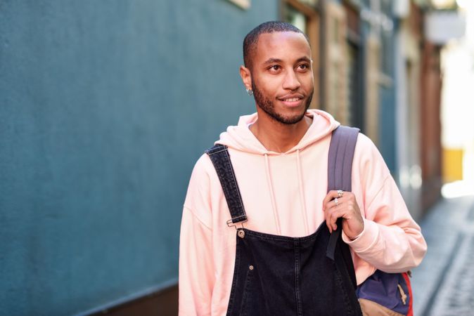 Happy male looking up on outdoor street