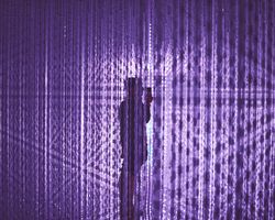 Tokyo, Japan - November 19th, 2019: Man inside purple art installation