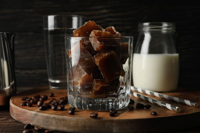 Composition of prepare ice coffee on wooden background