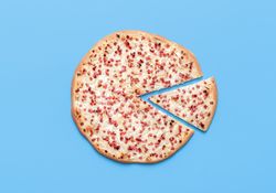 Tarte flambee above view on a blue background