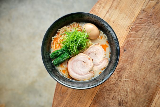 bowl with ramen soup in cafe