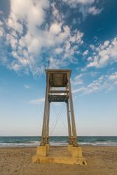 Observation tower at empty seashore