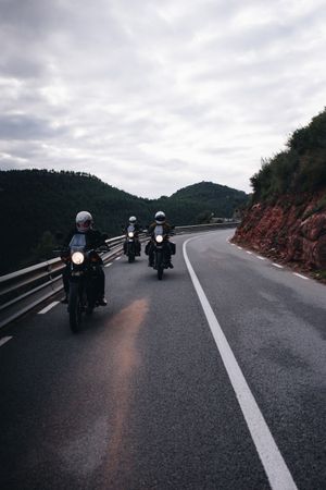 Motorbike club riders traveling together to the mountains