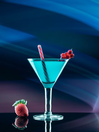 Glass with drink and berries