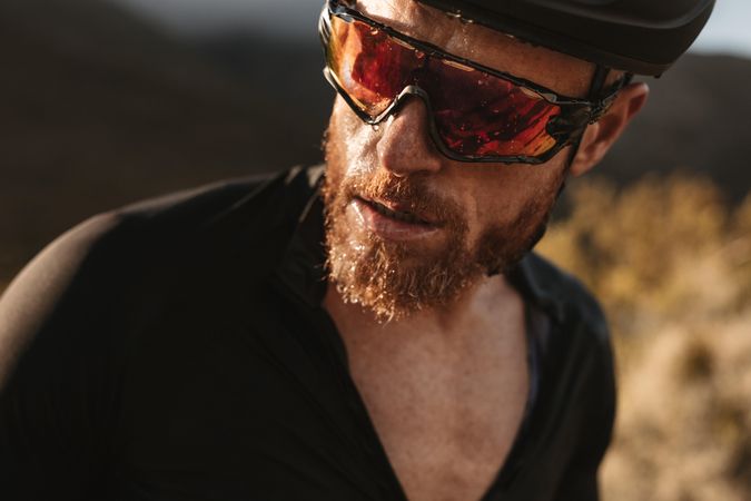 Male cyclist with sweat on his face