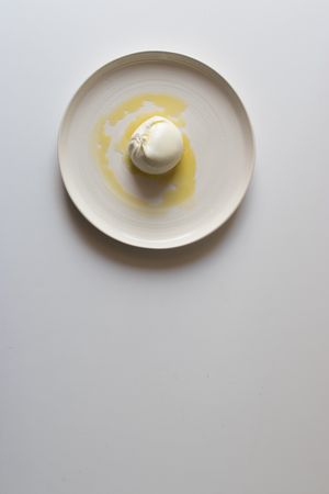 Fresh cheese with oil