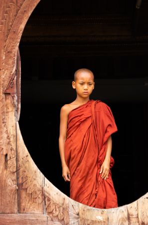 Mandalay, Myanmar - June, 25 2012: Monk boy in monastery