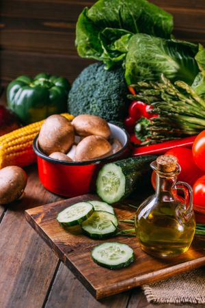 Vegetables and utensils on kitchen table