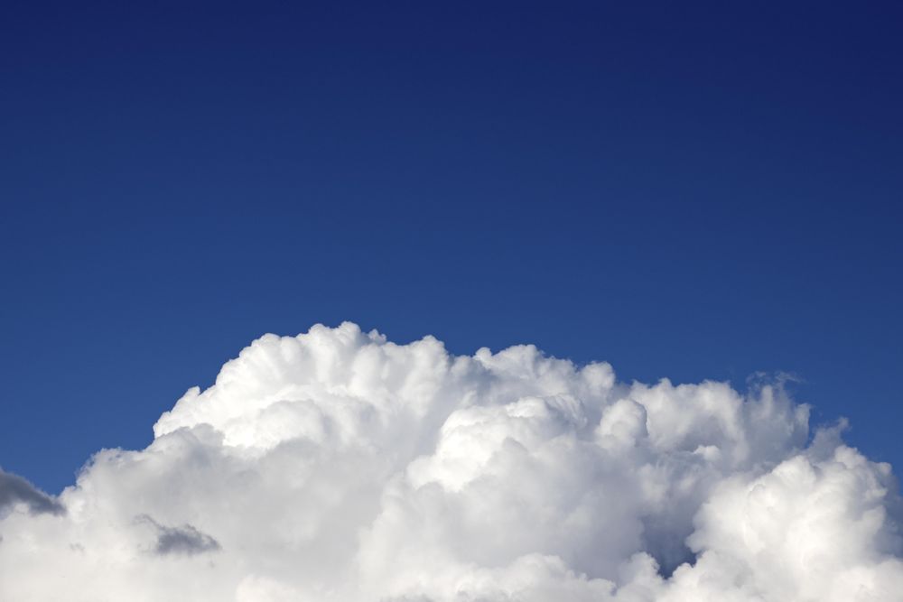 Big clouds on blue sky