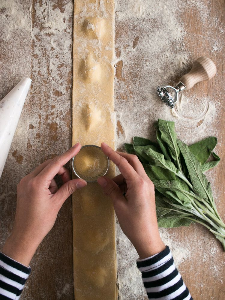 Sorrel and kitchenware near raviolis