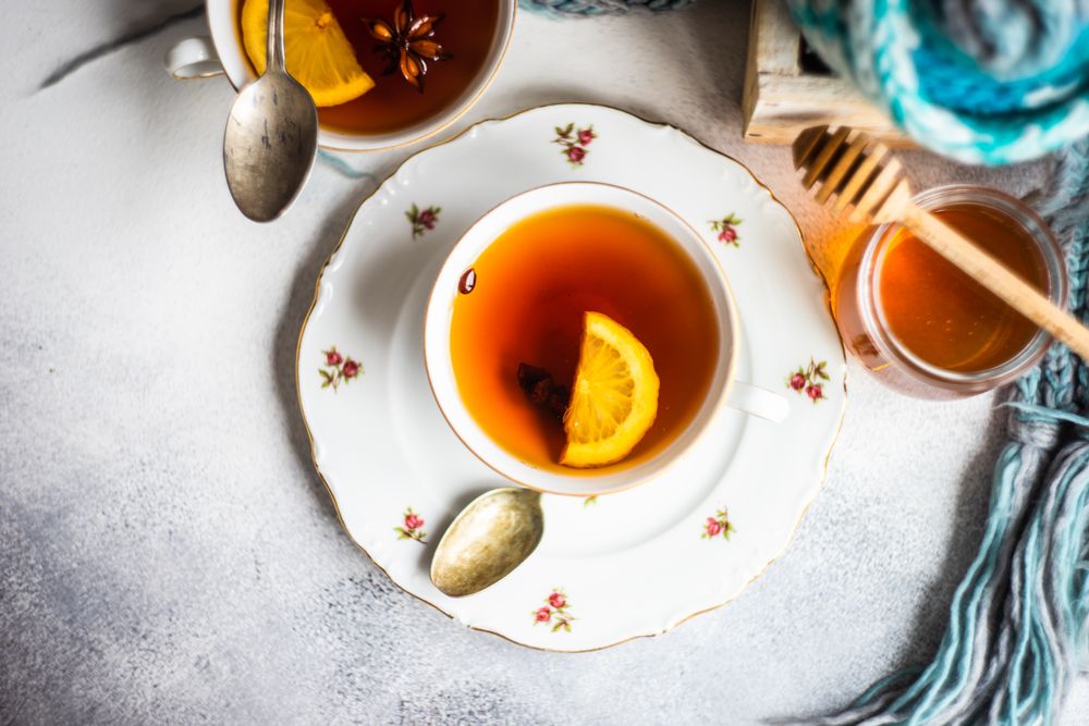 Top view of tea in cup and saucer on counter