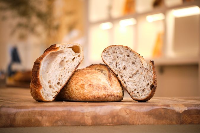Still life photo of rustic bread on a wooden background with nat