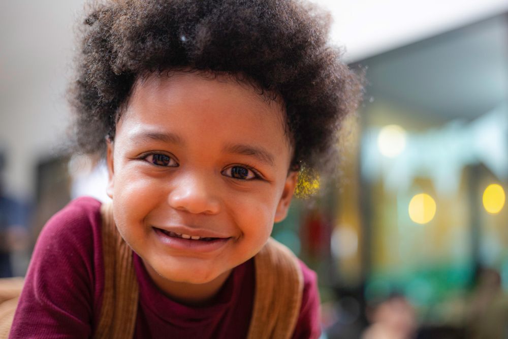 Cute boy smiling at camera