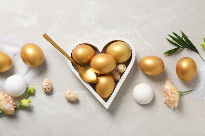 Concept of Richness, golden eggs, top view