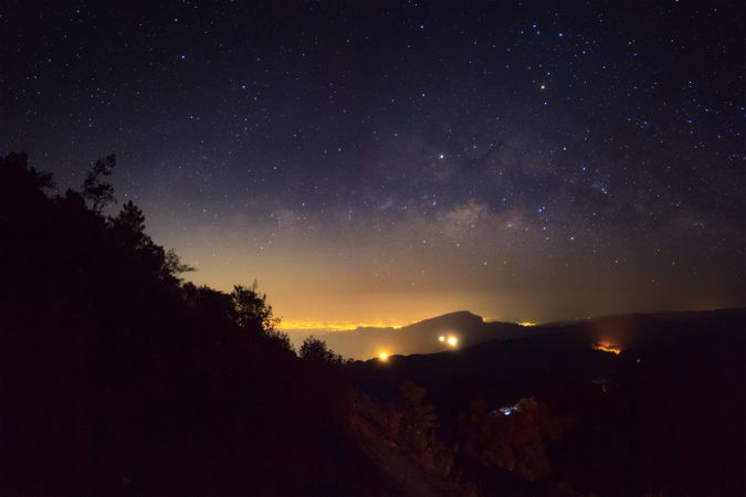 Milky way galaxy with stars and space dust in the universe, Long exposure photograph, with grain.
